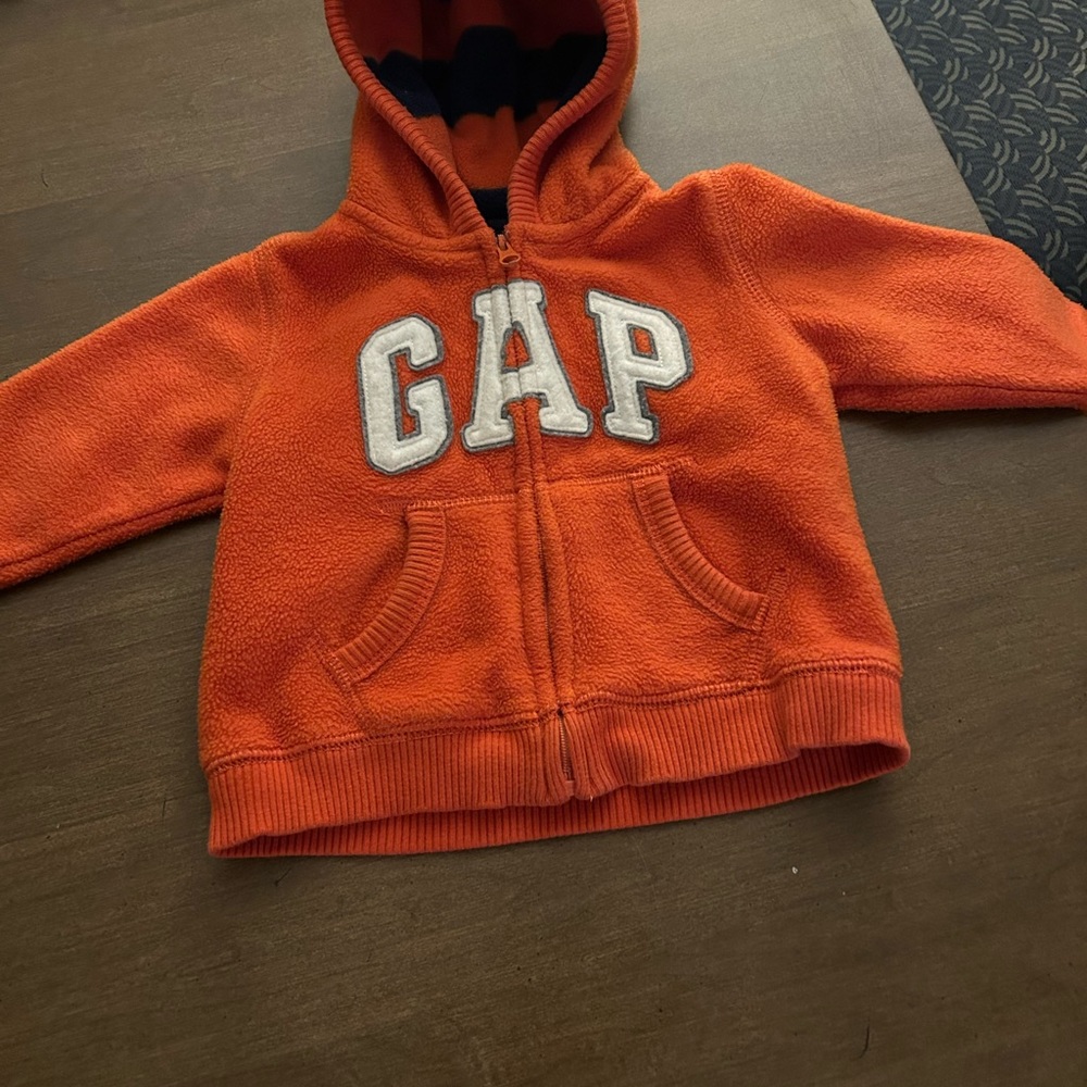 A beautiful GAP orange sweatshirt size 12-18 months